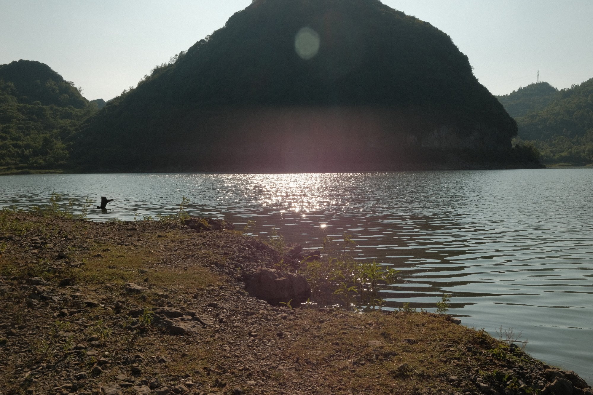 A ridge and its reflection at dusk